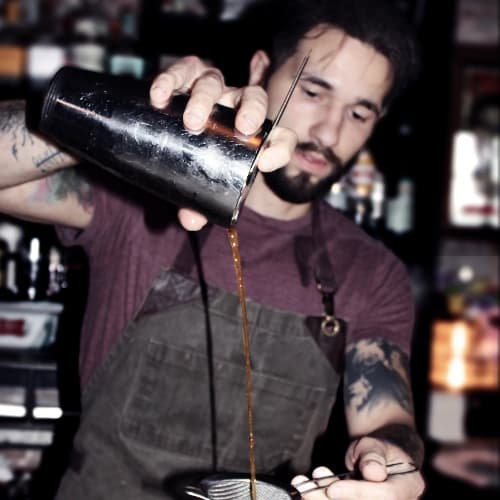 Jesse Roldan behind the bar
