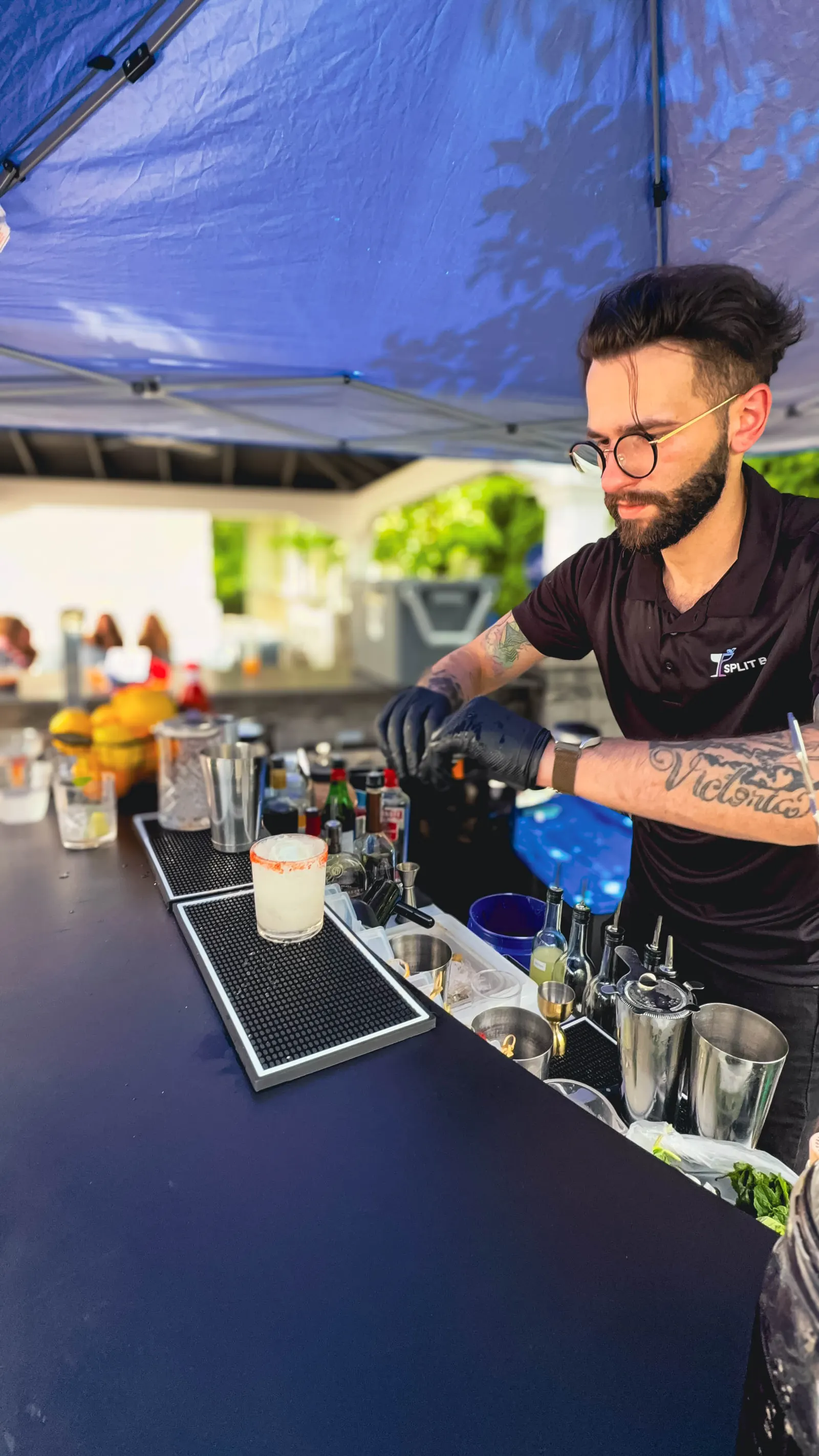 Fresh margarita with a salted rim served at the backyard bar