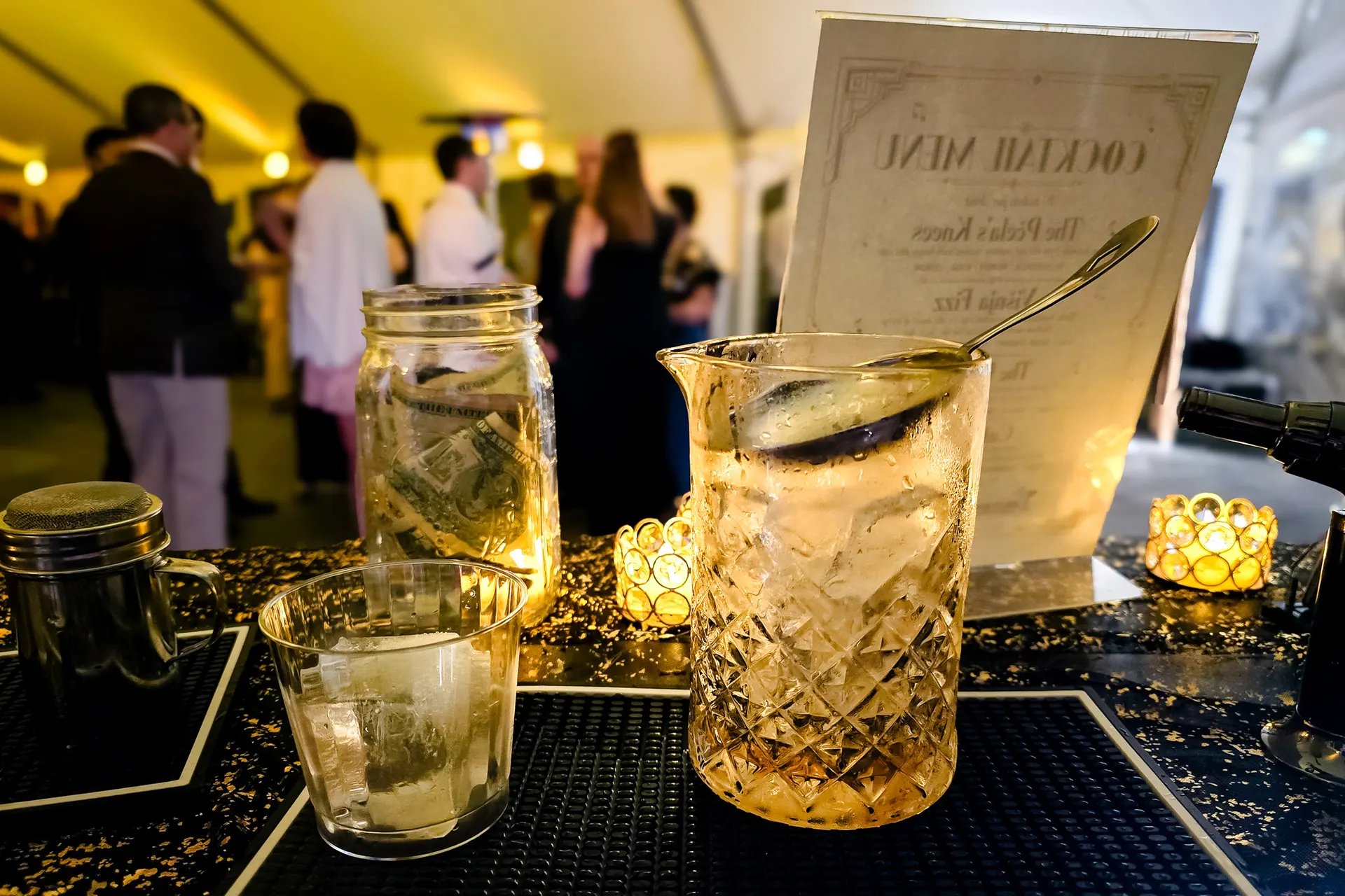 Stirred cocktail coming together in a crystal mixing glass at the Serbian Festival
