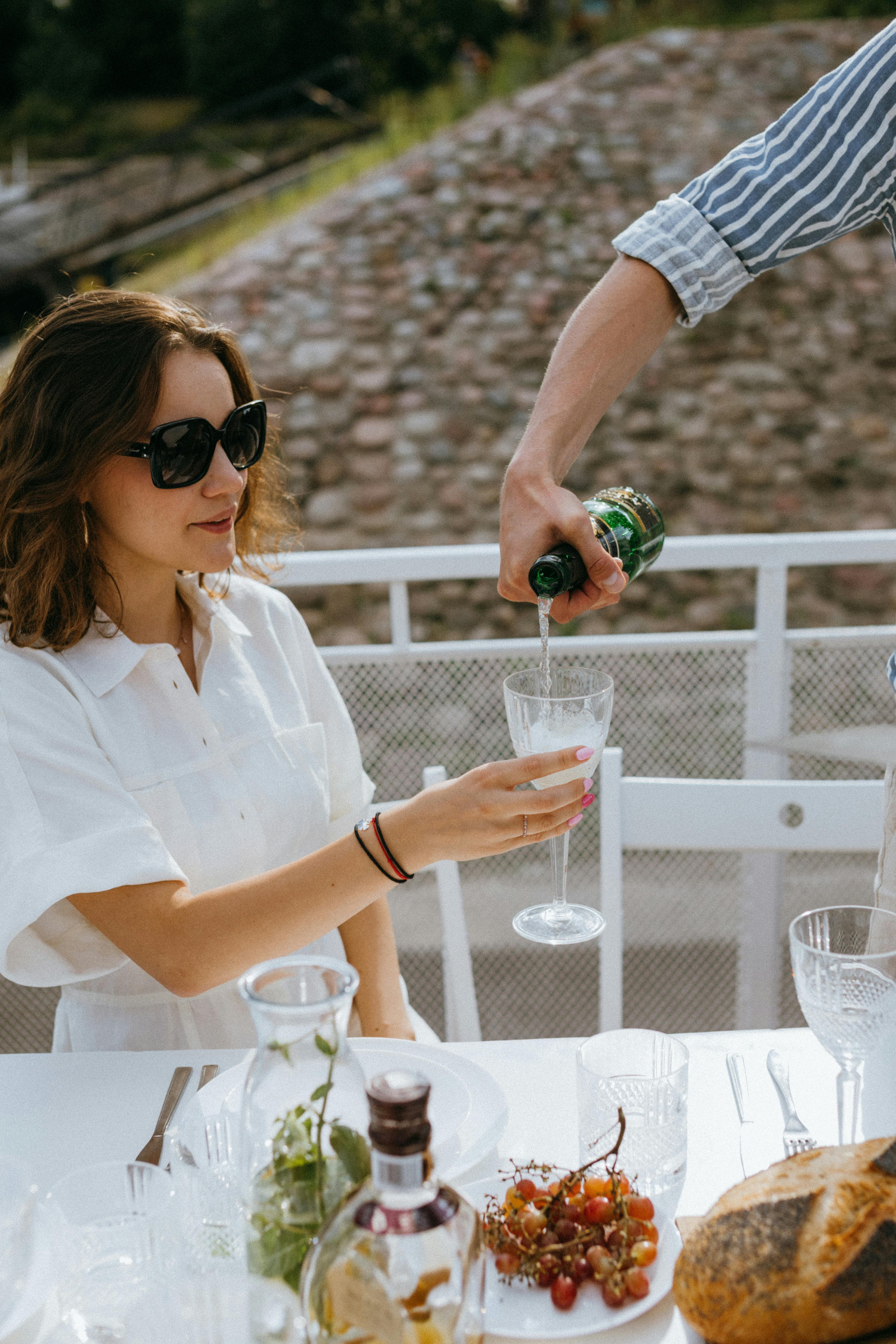 Private Parties - a man pouring champagne on a woman s glass